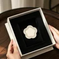Elegant white gift box with black velvet lining and floral jewelry display tray. - Round Edge Plum Blossom