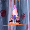 Halloween LED leuchtender Hexenhut mit Spinnennetz-Muster, ideal für Party-Dekoration. - Leuchtend / Orange