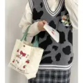 Cute corduroy tote bag with plush rabbit embroidery, stylish knit vest and plaid skirt outfit set. - Green Handle