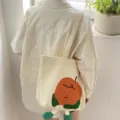 Canvas tote bag for women large capacity shoulder bag cute cartoon print casual handbag student - Red Apple Little Man Shoulder Bag / Beige