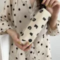 Minimalist canvas pencil case with cute letter prints, portable stationery pouch for students. - Full-width Letters