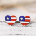 Close-up of heart-shaped wooden stud earrings with patriotic red white blue flag pattern. - Striped Blue Background Single Star Heart Style (SHE738)