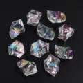 Close-up view of irregular acrylic iridescent ice stones displaying colorful reflections. - 50 Pieces/Pack / Transparent Iridescent