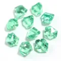 Close-up detail of green acrylic simulated ice stones, transparent crystal irregular craft decor. - 50 Pieces/Pack / Grass Green