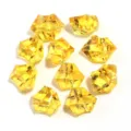 Detailed view of yellow acrylic fake ice crystals, irregular transparent DIY craft stones. - 50 Pieces/Pack / Orange Yellow