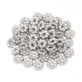 Stainless steel flower spacer beads, perfect for DIY jewelry making and handmade bracelets. - 20 Pieces/Pack / Steel / 4mm