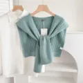 Green knit shawl for women, stylish cable knit layering piece paired with white shirt outerwear. - Twist - Bean Green
