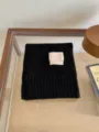 Bufanda de punto negro para invierno, cálida y suave, textura cómoda y estilo casual. - Negro