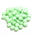 Green acrylic flat round beads with cute star and flower patterns for DIY jewelry making. - 100 Pieces Per Pack (Approx Diameter 7mm) / White Patterns on Green