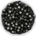 Close-up detail of black acrylic letter N beads, round loose beads for DIY jewelry making. - Letter N / 100 Pieces Set