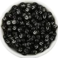 Close up of black acrylic flat round letter beads with white letter U for DIY jewelry making. - Letter U / 100 Pieces Set