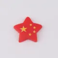 Close-up detail of the red star resin charm with yellow five-pointed stars, ideal for DIY phone case craft. - Star Shape (3#)