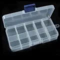 Clear plastic storage box with blue latch, multi-compartment organizer for small items. - 10-Slot Box