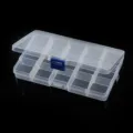 Clear plastic storage box with blue latch, multi-compartment organizer for beads and crafts. - 15-Grid Box