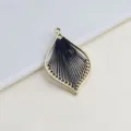 DIY metal leaf pendant charm with black string weaving jewelry accessory detail view. - Black