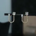 Detail van elegante vergulde strass-ketting oorhangers, sprankelende zirkonia sieraden. - Stijl 3 / Goud