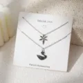 Prachtige dubbellaags zilveren ketting met zwarte kristallen zwaan hanger details. - Zwaan