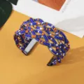Boheemse kralen kruis open manchet armband, stijlvolle etnische modejuwelen voor dames. - Zwart Blauw Oranje Wit