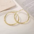 Elegante vergulde grote ronde creolen oorbellen voor vrouwen, klassieke minimalistische stijl. - 60mm / Goud