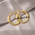 Gouden holle messing creolen 40mm minimalistisch C-vormig ontwerp voor vrouwen elegante dagelijkse. - 40mm / Goud