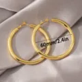 Elegante grote gouden oorbellen creolen, minimalistische dikke koperen oorringen 60mm. - 60mm / Goud