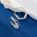 Elegante geometrische parelcreooloorringen met goudkleurige afwerking, stijlvol chic ontwerp. - Polygoon Geometrische Parel Stijl (Stijl 5) / Goud