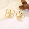 Gouden in elkaar grijpende ring oorbellen geometrisch design variant stijl vrouwen - Klavertje Vier Geometrische Lus Stijl (A-002) / Goud
