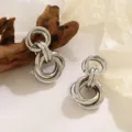 Geometrische zilveren oorkringen met meerdere ringen, eenvoudig en veelzijdig sieraad. - Multi-Ring 3D Verweven Stijl (A-012) / Witgoud