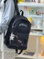 Μαύρη καθημερινή σχολική τσάντα πλάτης με κέντημα άνθους δαμασκηνιάς και αστέρι. - Μαύρο + Ασημένιο Αστέρι