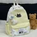 Leuke gele en witte canvas rugzak met ster- en kattenprint, grote schooltas voor meisjes. - Zonder Hanger / Geel