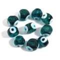 Glass evil eye beads detail view, turquoise flat round DIY bracelet jewelry charm accessory. - 10 Pieces Pack / Dark Green