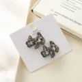 Sparkling rhinestone puppy hair clip close-up, exquisite crystal side clip for daily fashion. - Black Gray Puppy