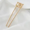 Gold U-shaped hair fork detail, cute crab design, smooth metallic finish for styling. - Crab