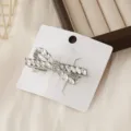 Exquisite crystal rhinestone bow hair clip, silver alloy fashion hair accessory for daily wear. - Silver Rhinestone Bow