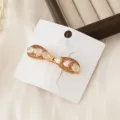 Elegante pinza de pelo con lazo de diamantes dorados accesorio para el uso diario - Lazo Dorado