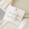 Ensemble de pinces à cheveux dorées avec cristaux zircon brillants et breloques cœur pour femmes. - Or Étoilé