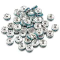Silver tone metal rhinestone spacer beads with blue crystals for DIY jewelry making and bracelets. - Silver & Sky Blue Rhinestone / 50 Pcs/Pack, Outer Diameter 4mm