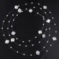 Chaine de perles fil de peche vue de detail pour artisanat DIY et decoration de mariage. - 1 Mètre / Coquillage + perle artificielle 3 mm