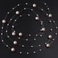 Chaîne de perles sur ligne de pêche pour loisirs créatifs, accessoires de mode et déco de mariage. - 1 Mètre / 8 mm + perle artificielle marron 3 mm