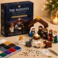 Detailed view of 3D Nativity bead craft kit with colorful beads, tools and finished figurines. - The Nativity