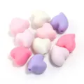 Close-up detail of cute pastel heart-shaped loose beads for DIY handmade bracelets and necklaces. - Size Approx. 15x17mm, Hole Approx. 2.9mm / Purple + Pink Colors