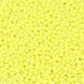Detailed close-up of vibrant yellow teardrop glass seed beads, ideal for DIY jewelry making. - 20g/Pack / Yellow