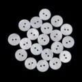 Close-up detail of natural white mother of pearl two-hole buttons for shirt sewing accessories. - Diameter: 9mm, 20 Pcs/Pack / Two-Hole Round Shell Buttons