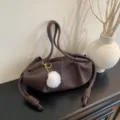 Brown soft leather slouchy shoulder bag with knotted handle and cute furry pompom charm. - With Pendant / Coffee
