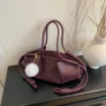 Dark purple soft leather handbag, stylish knotted shoulder bag for women, chic cloud tote design. - With Pendant / Burgundy