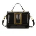 Black patent leather handbag with gold metal buckle, vintage single shoulder cross body bag. - Black
