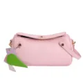 Chic pink cylindrical shoulder bag for women, stylish crossbody bag with cute charm. - Pink