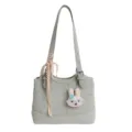 Fashion green shoulder bag for women, commuter handbag with cute rabbit pendant and floral print. - Green