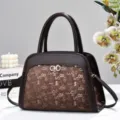 Elegante borsa da donna marrone in pelle con chiusura elegante e design capiente. - Caffè