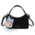 Black chic top-handle shoulder bag with cute fluffy puppy plush charm for daily commute. - With Charm / Black